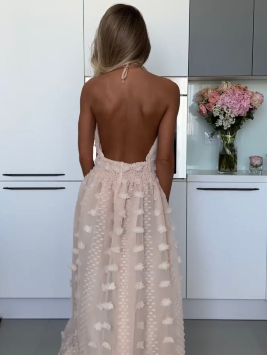 Hand-embroidered halterneck lace dress