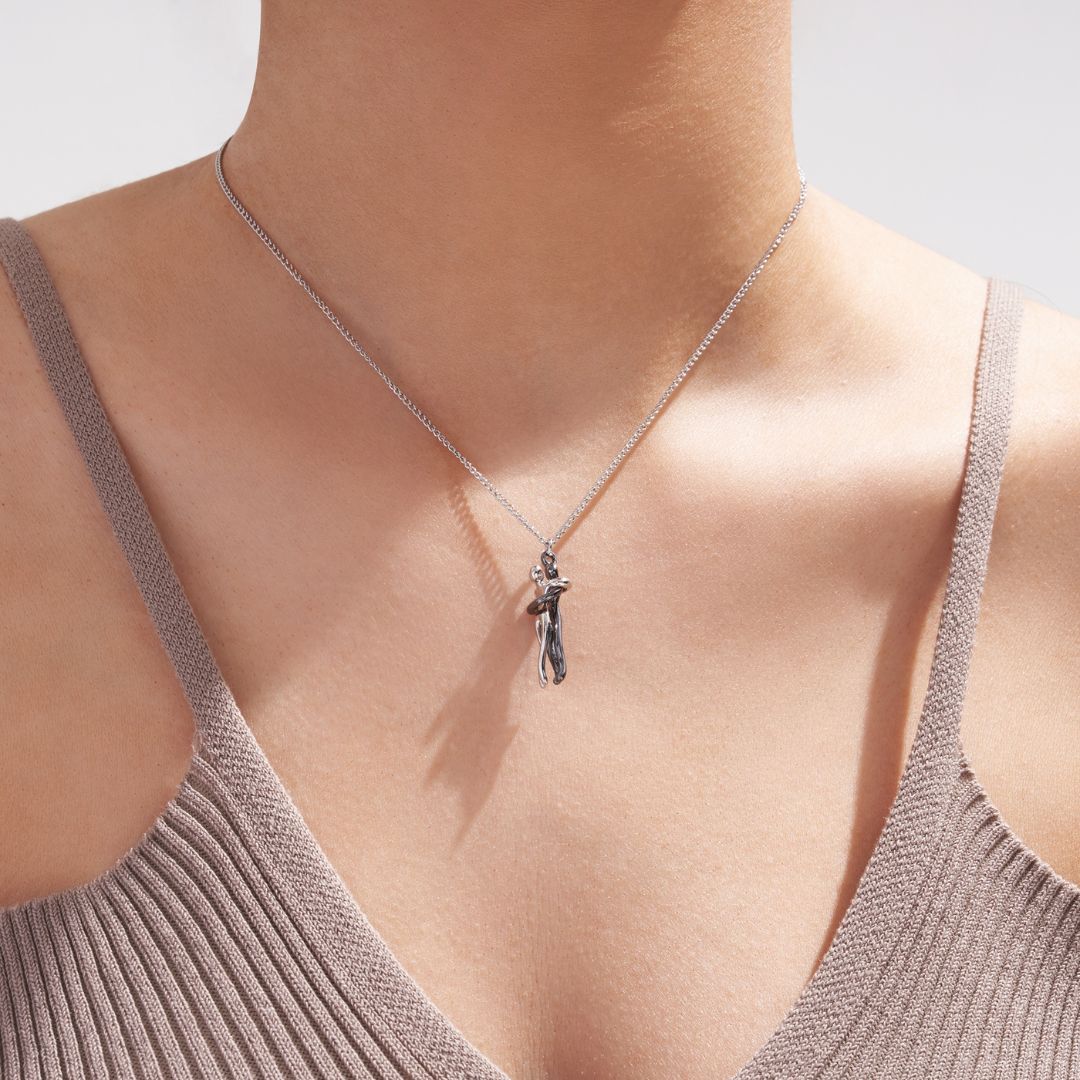 Couple Embrace Pendant Necklace